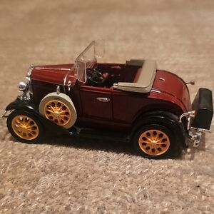 1931 Ford Model A Roadster. It is finished in a color Rubelite Red